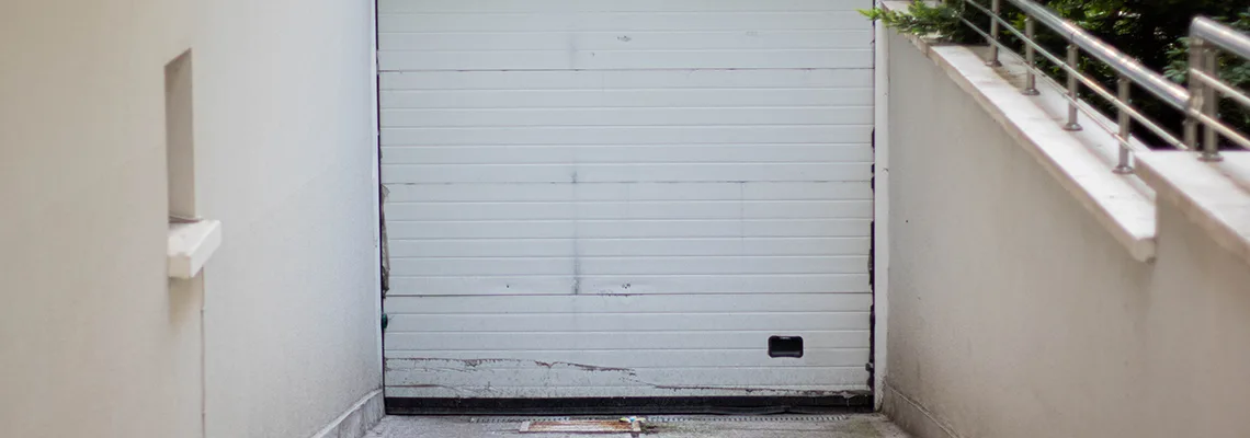 Overhead Bent Garage Door Repair in Calvin Park, Ontario