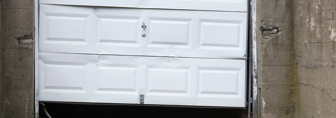 Garage Door Got Hit By A Car Dent Removal in Calvin Park, ON