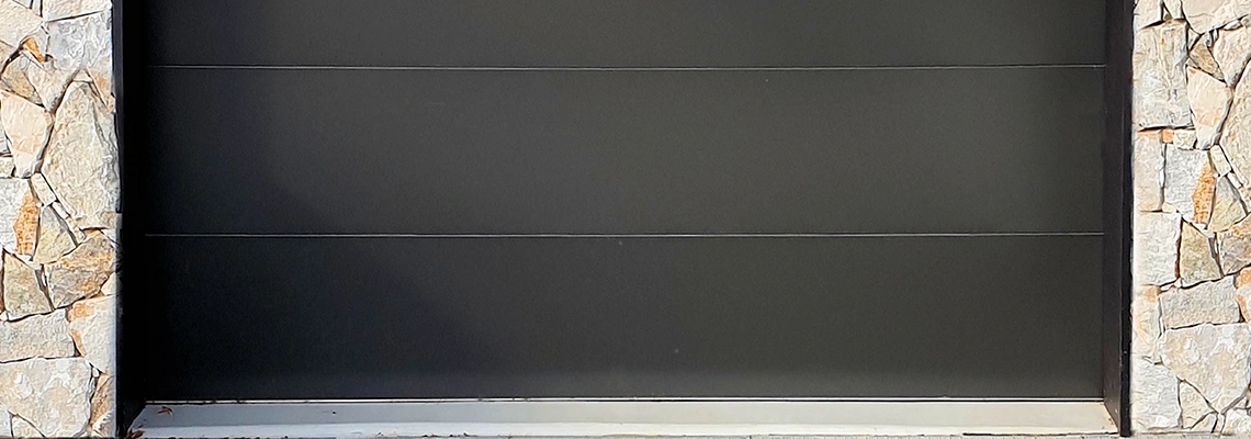 Overhead Black Garage Door Installation in Calvin Park, Ontario